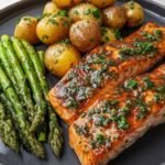 Herb-Crusted Baked Salmon with Roasted Baby Potatoes
